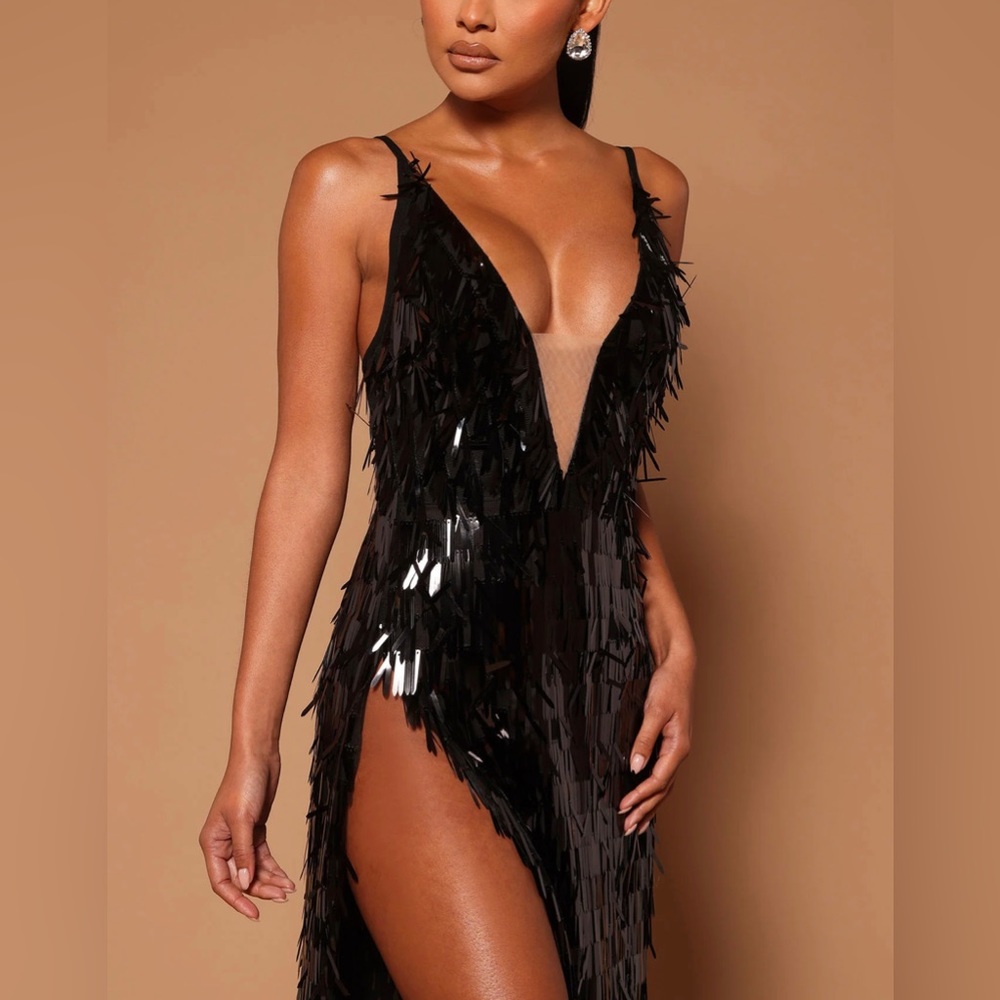 Super hot fringe black sleek dress with mesh and high thigh slit. Size XS